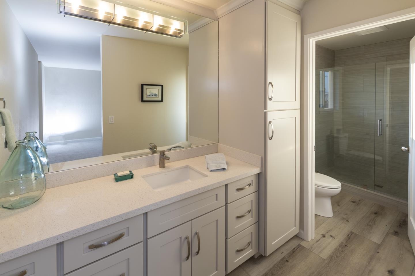 134 Hughes Road Watsonville, CA 95076 - Photo 17 of 26 a bathroom with a sink a toilet and shower