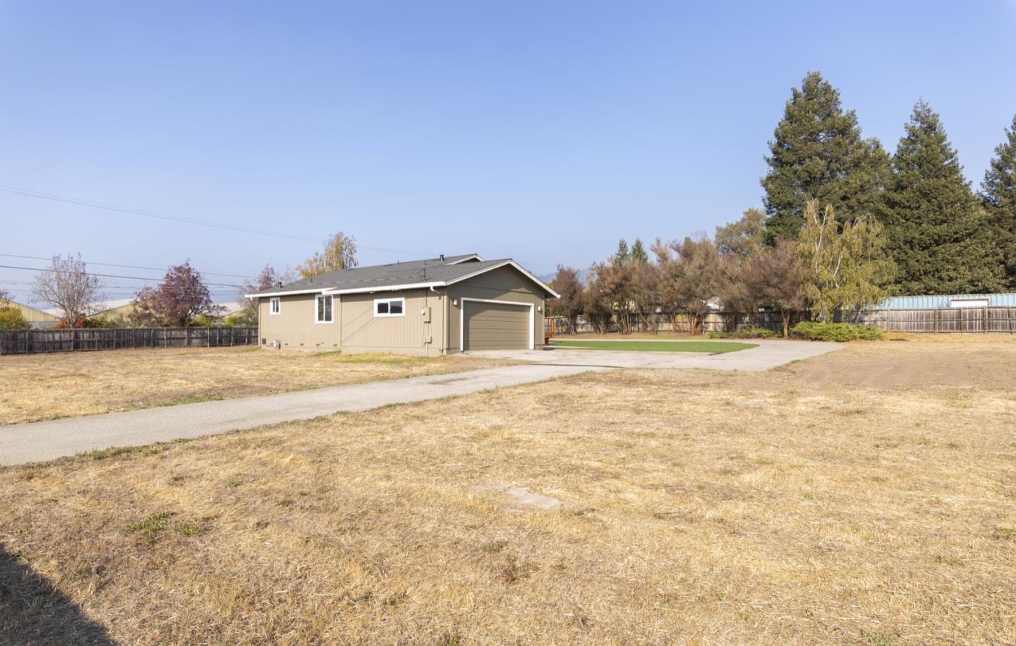 134 Hughes Road Watsonville, CA 95076 - Photo 21 of 26 a house with trees in the background