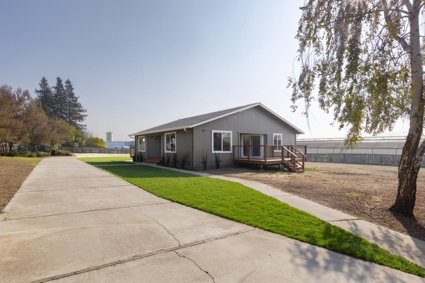 134 Hughes Road Watsonville, CA 95076 - Photo 3 of 26 a front view of a house with yard