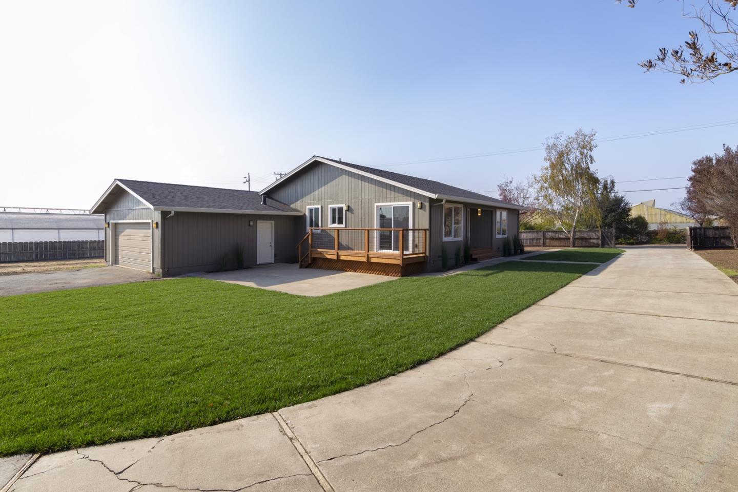 134 Hughes Road Watsonville, CA 95076 - Photo 4 of 26 a front view of house with yard and green space