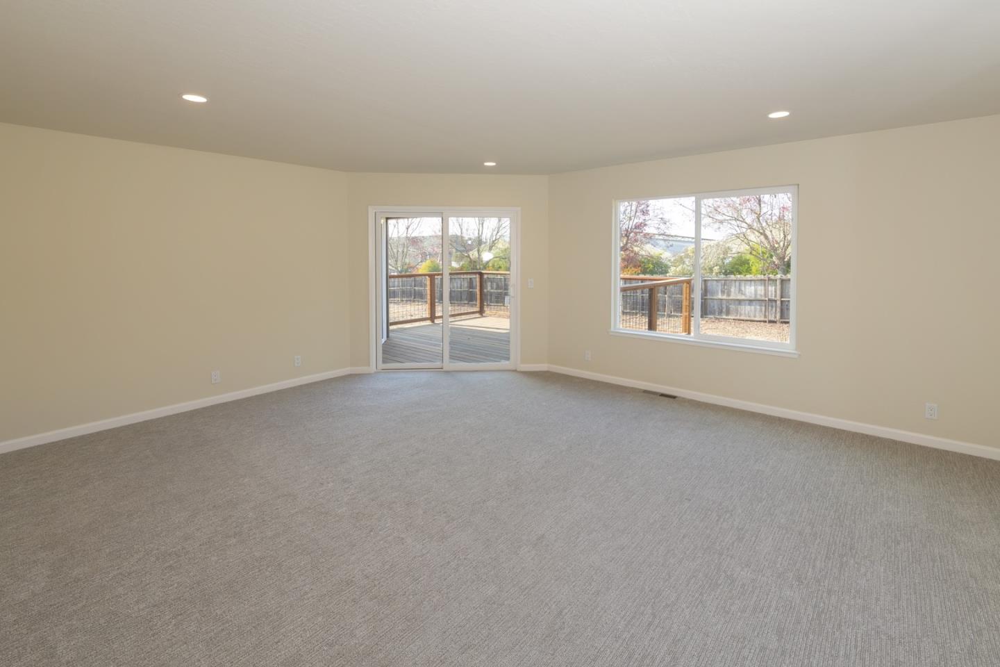 134 Hughes Road Watsonville, CA 95076 - Photo 9 of 26 an empty room with windows