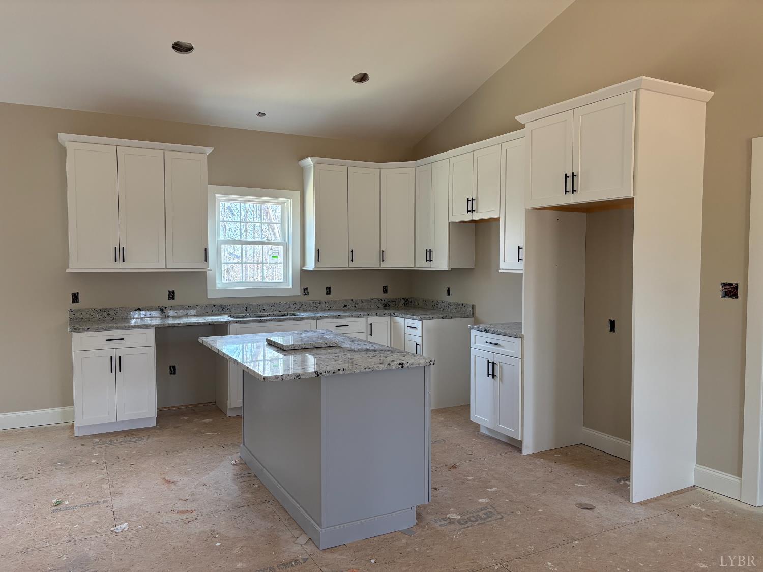 1094 Skinnell Mill Road Bedford, VA 24523 - Photo 2 of 6 a kitchen with cabinets appliances a sink and a window