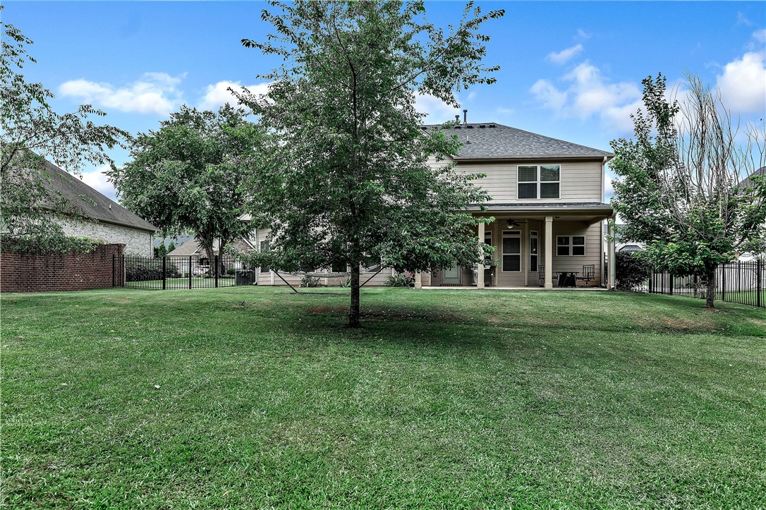 144 Buckland Drive Anderson, SC 29621 - Photo 28 of 48 A spacious backyard provides ample green space, perfect for outdoor activities and relaxation.