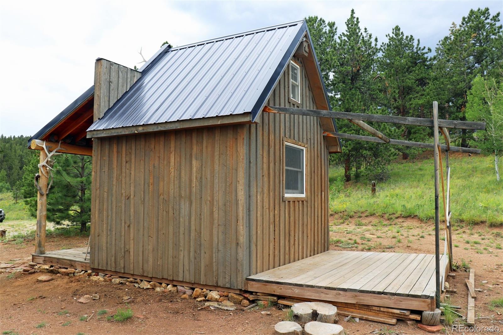 49 Pitchfork Road Hartsel, CO 80449 - Photo 27 of 28 a backyard of a house with lots of green space