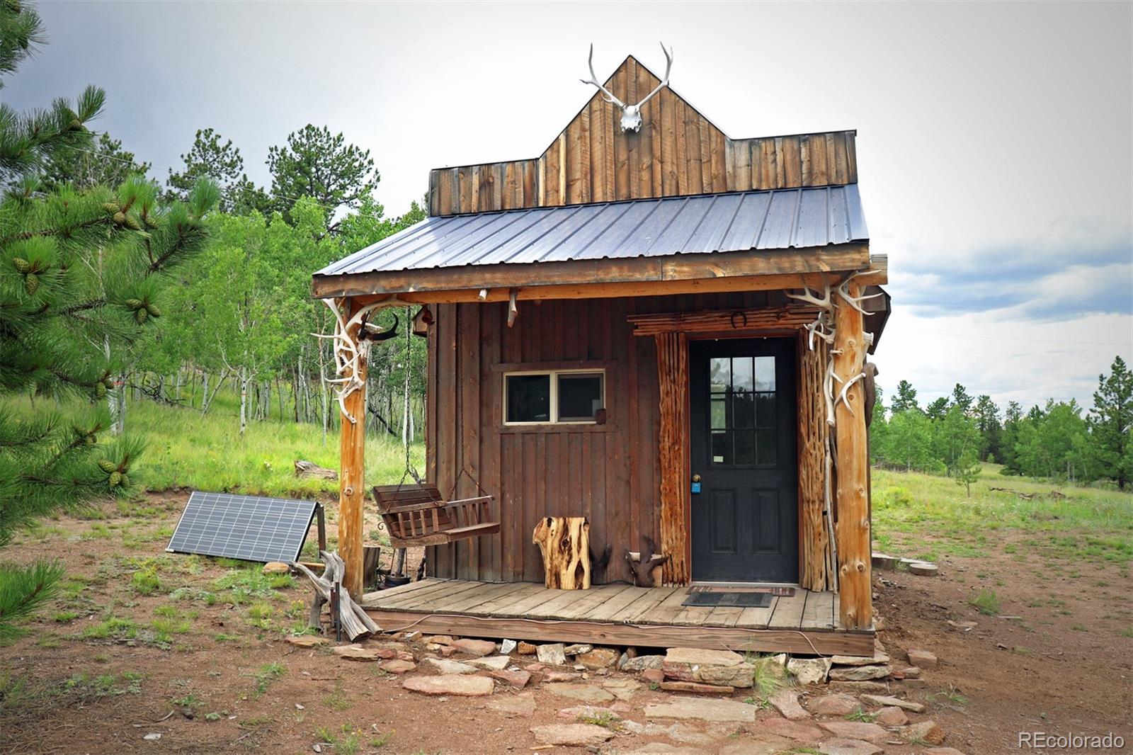 49 Pitchfork Road Hartsel, CO 80449 - Photo 28 of 28 a front view of a house with garden
