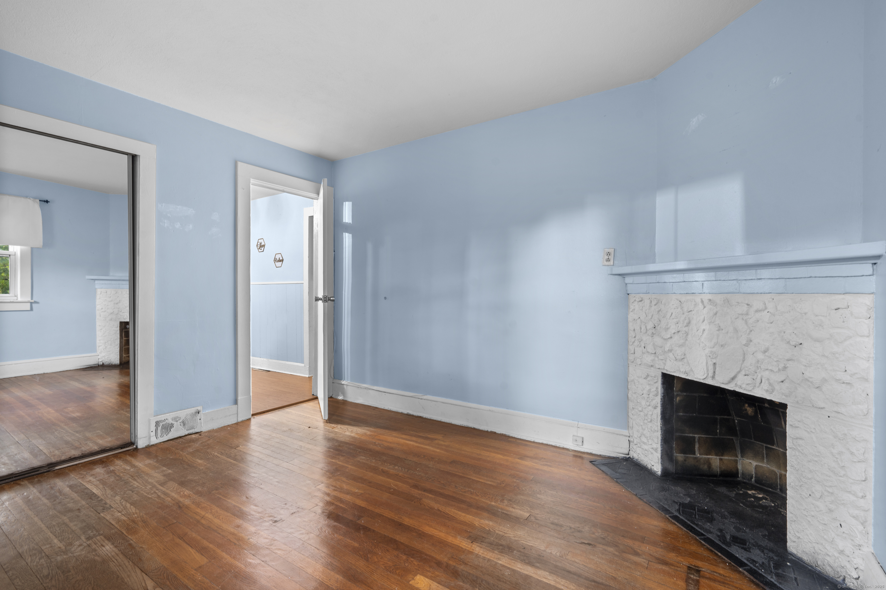67 Elizabeth Avenue Bloomfield, CT 06002 - Photo 11 of 20 a view of a livingroom with a fireplace