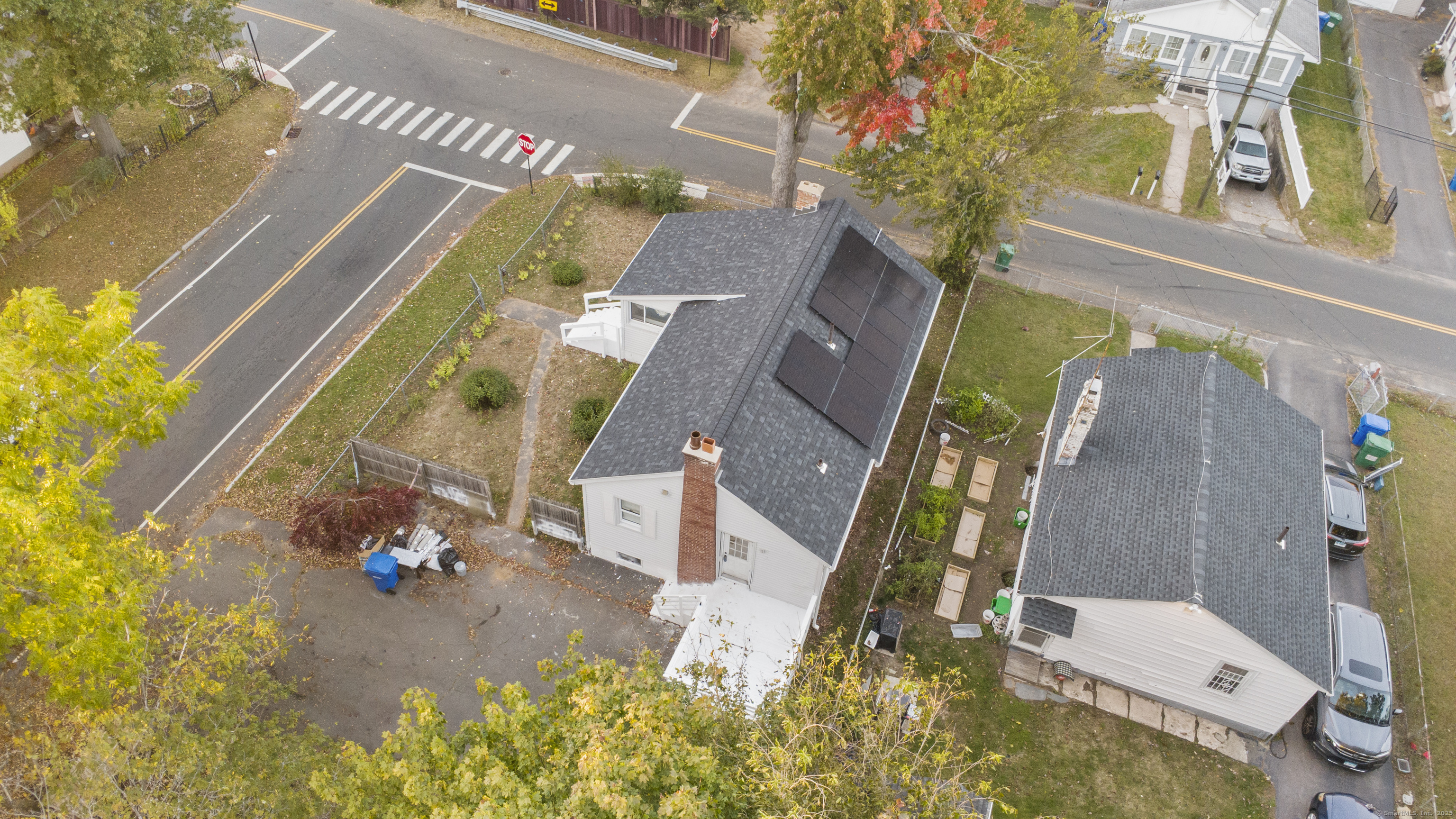 67 Elizabeth Avenue Bloomfield, CT 06002 - Photo 16 of 20 an aerial view of a house with a yard and a large tree