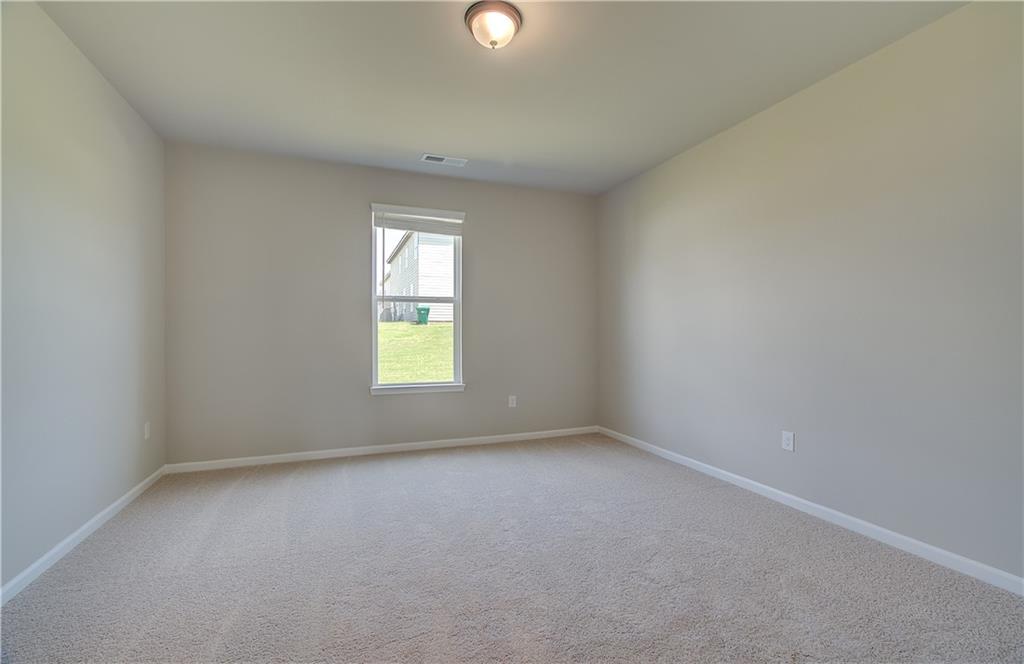 733 Dunlake Way Locust Grove, GA 30248 - Photo 4 of 30