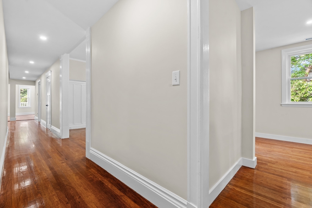 35 George Street, Unit 35 Newton, MA 02458 - Photo 18 of 36 a view of a hallway with wooden floor