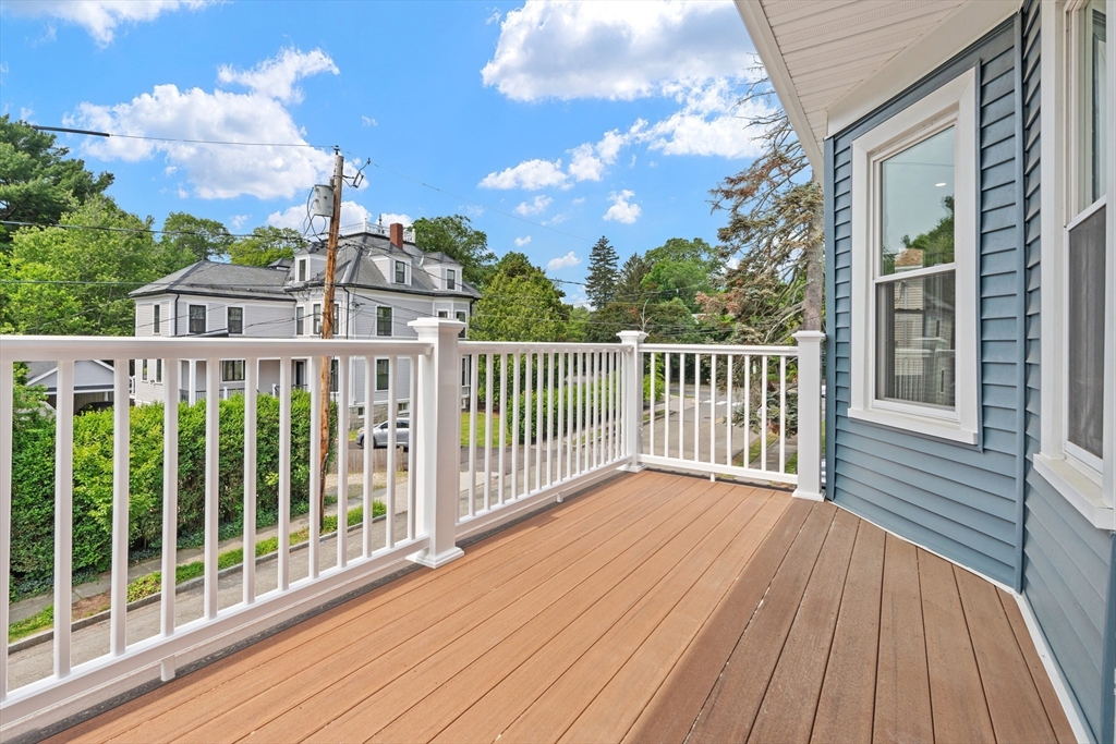 35 George Street, Unit 35 Newton, MA 02458 - Photo 26 of 36 a view of a houses with a balcony