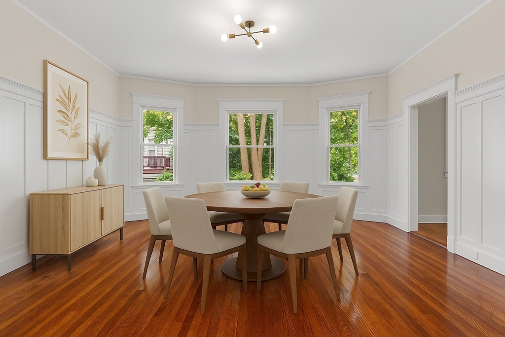 35 George Street, Unit 35 Newton, MA 02458 - Photo 29 of 36 a view of a dining room with furniture window and wooden floor
