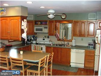 30 Valley Road Monroeville, NJ 08343 - Photo 8 of 12 a kitchen with stainless steel appliances granite countertop a sink and a stove