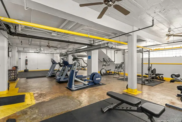a view of a gym with equipment