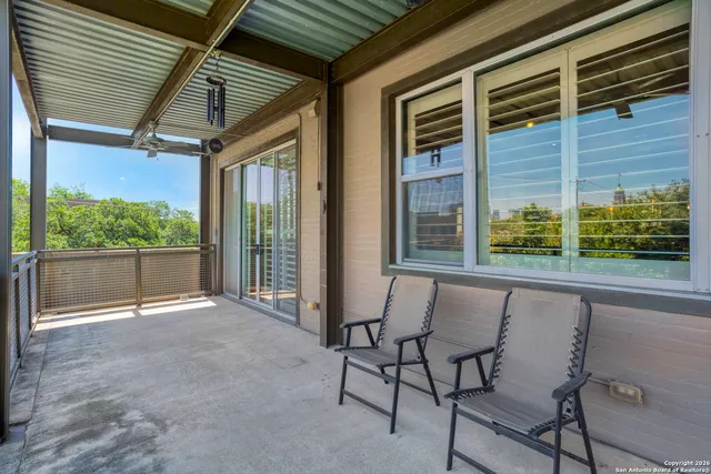 a view of an outdoor space with a balcony