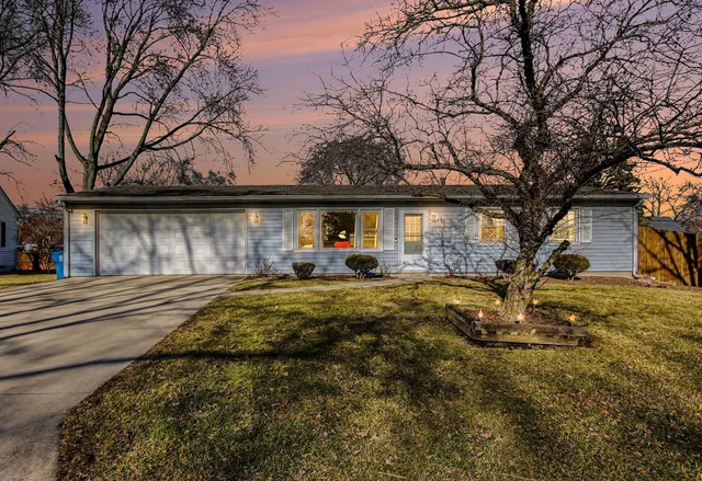 a view of swimming pool with a yard