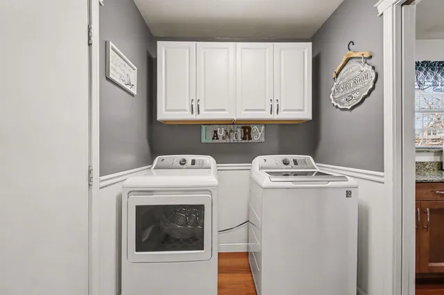 a utility room with dryer and washer
