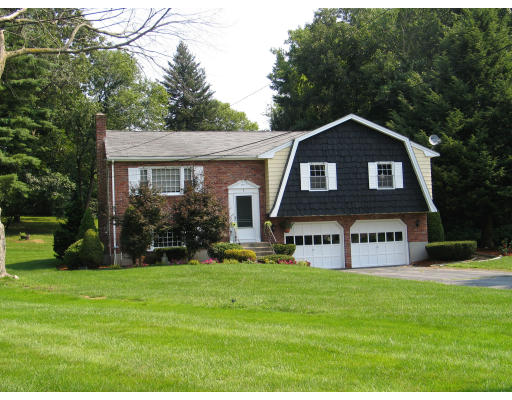 3 Coe Road Framingham, MA 01701 - Photo 1 of 8 a front view of a house with a yard