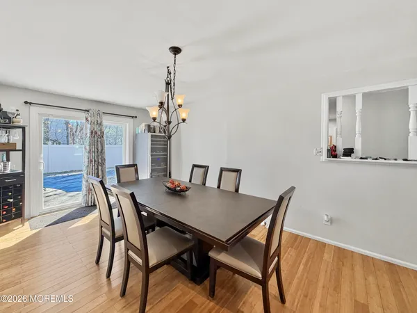 a kitchen with appliances a sink and cabinets