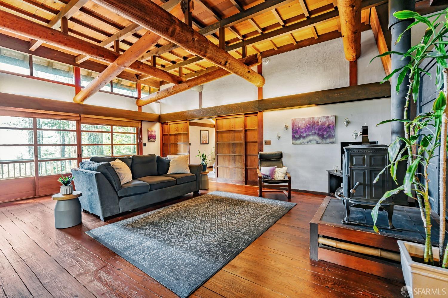 112 Marine Road Woodside, CA 94062 - Photo 6 of 22 a living room with furniture and wooden floor