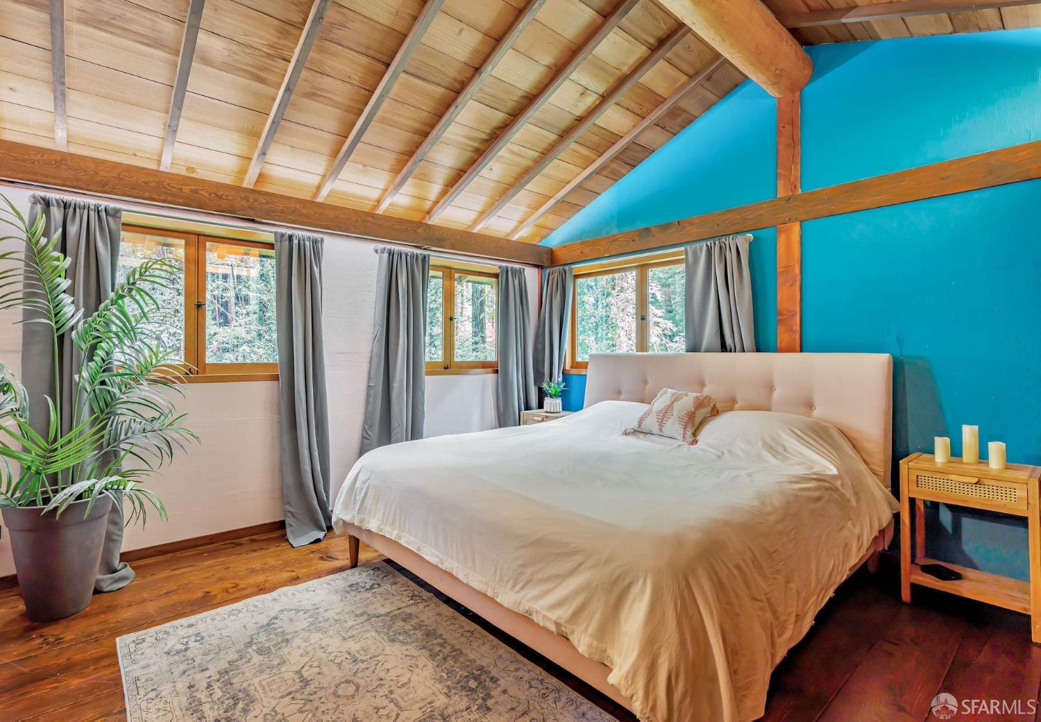 112 Marine Road Woodside, CA 94062 - Photo 9 of 22 a bed sitting in a bedroom next to a window