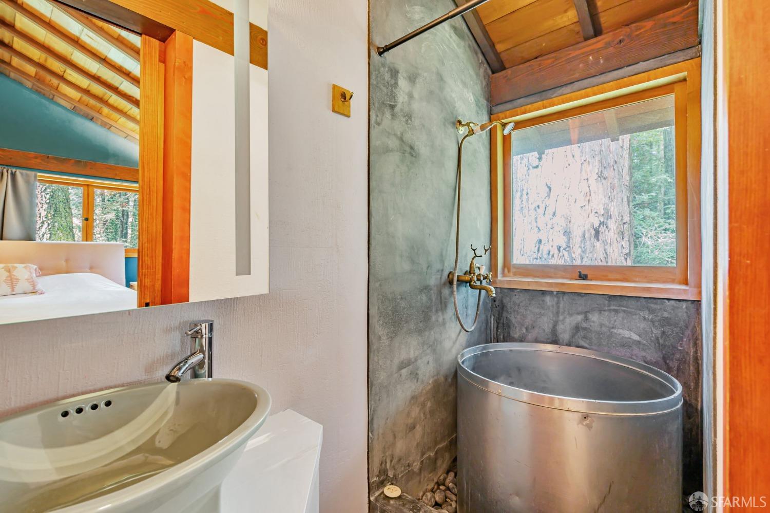 112 Marine Road Woodside, CA 94062 - Photo 10 of 22 a bathroom with a granite countertop sink and a bathtub