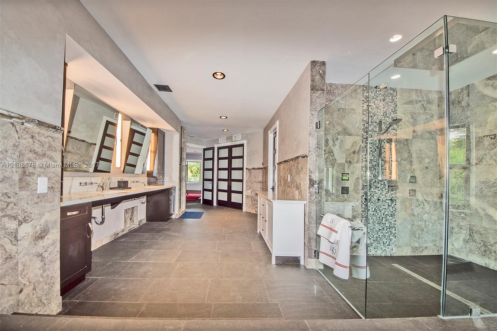 10270 Southwest 58th Street Miami, FL 33173 - Photo 18 of 35 a large white kitchen with a large tub
