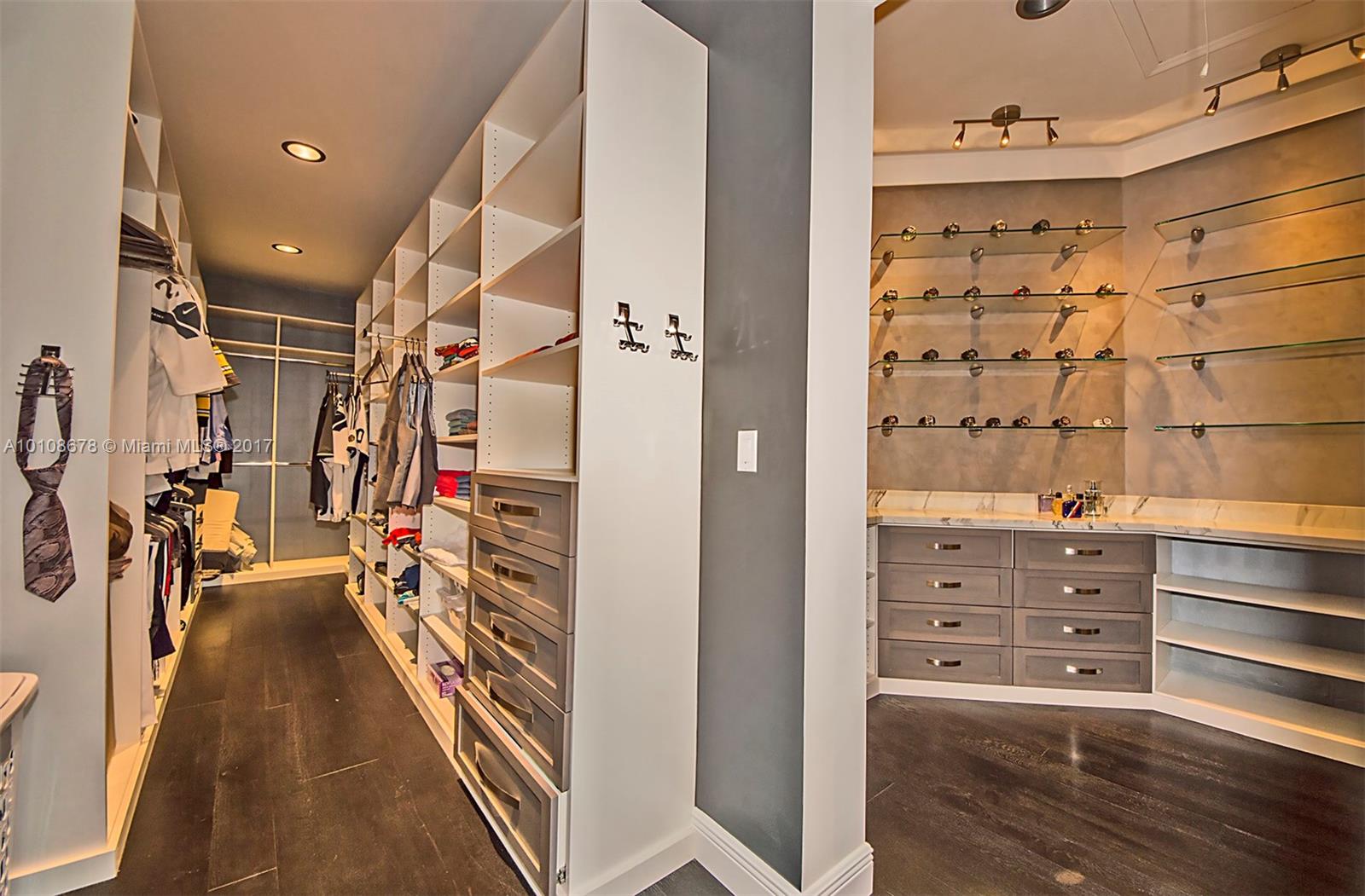 10270 Southwest 58th Street Miami, FL 33173 - Photo 21 of 35 a view of walk in closet and bathroom