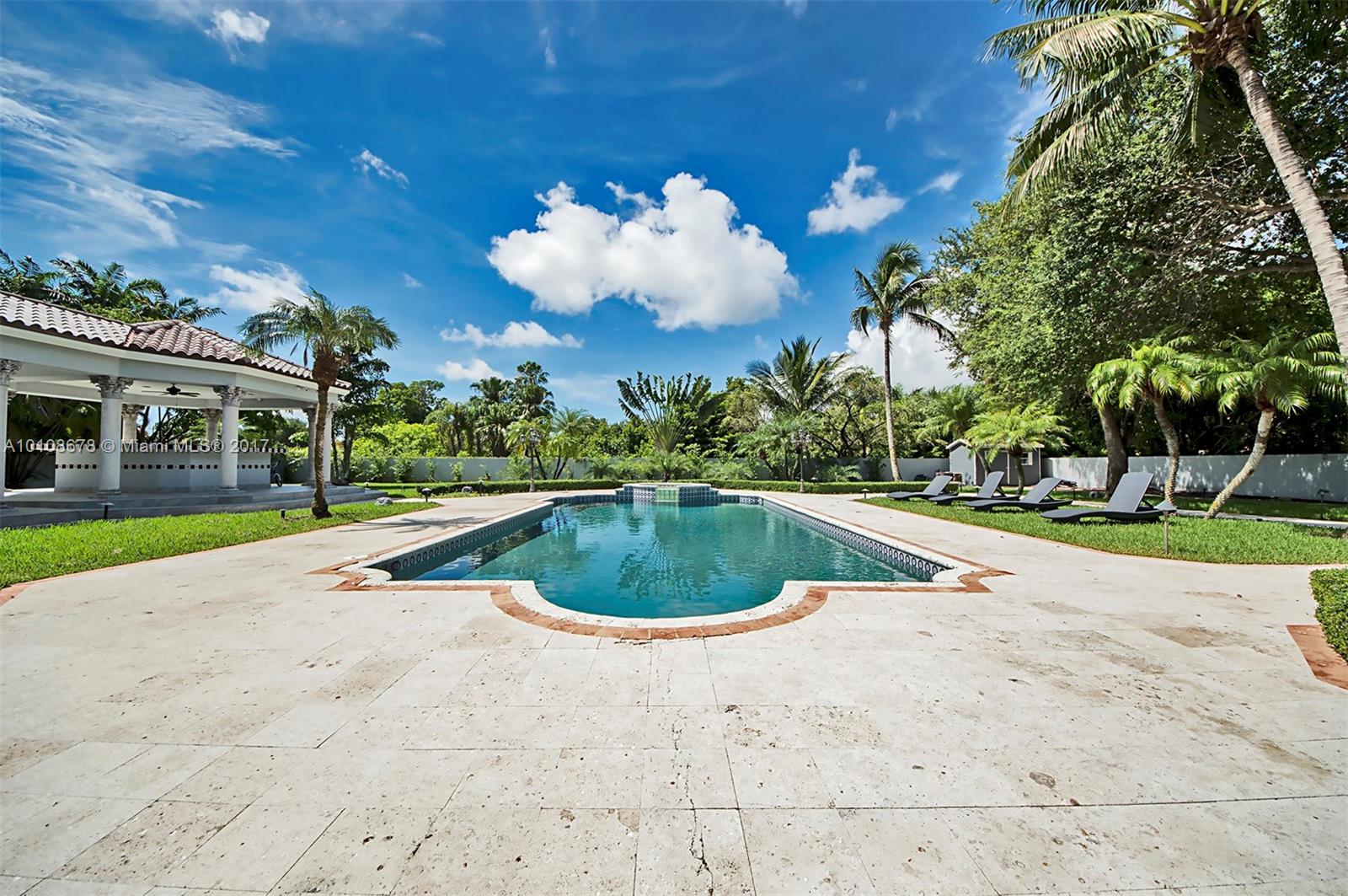 10270 Southwest 58th Street Miami, FL 33173 - Photo 35 of 35 a view of a house with a swimming pool