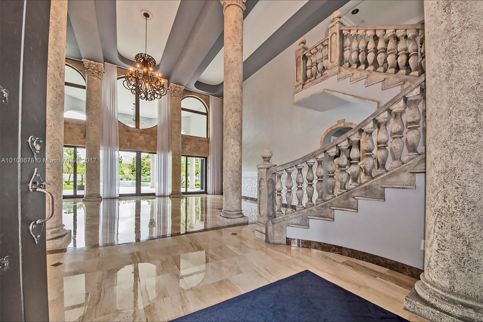 10270 Southwest 58th Street Miami, FL 33173 - Photo 4 of 35 a view of an entryway wooden floor and door