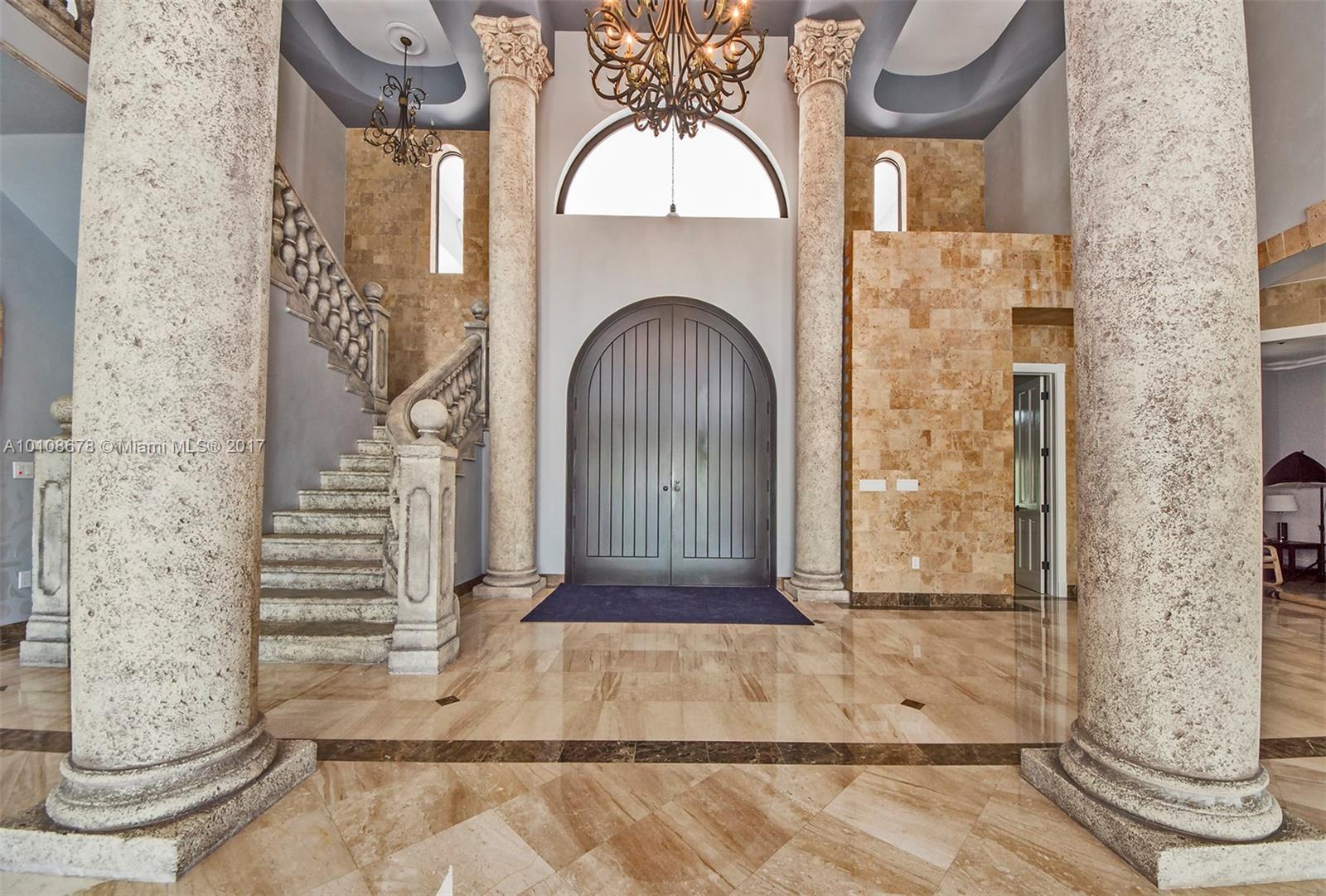 10270 Southwest 58th Street Miami, FL 33173 - Photo 6 of 35 a view of a entryway door front of house