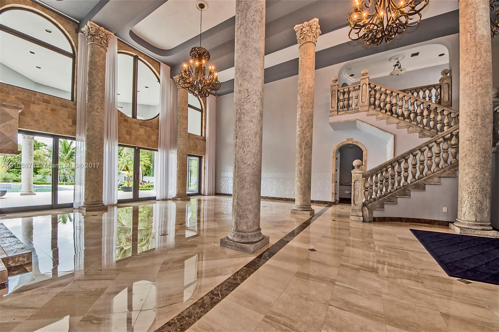 10270 Southwest 58th Street Miami, FL 33173 - Photo 7 of 35 a view of entryway and hall with wooden floor