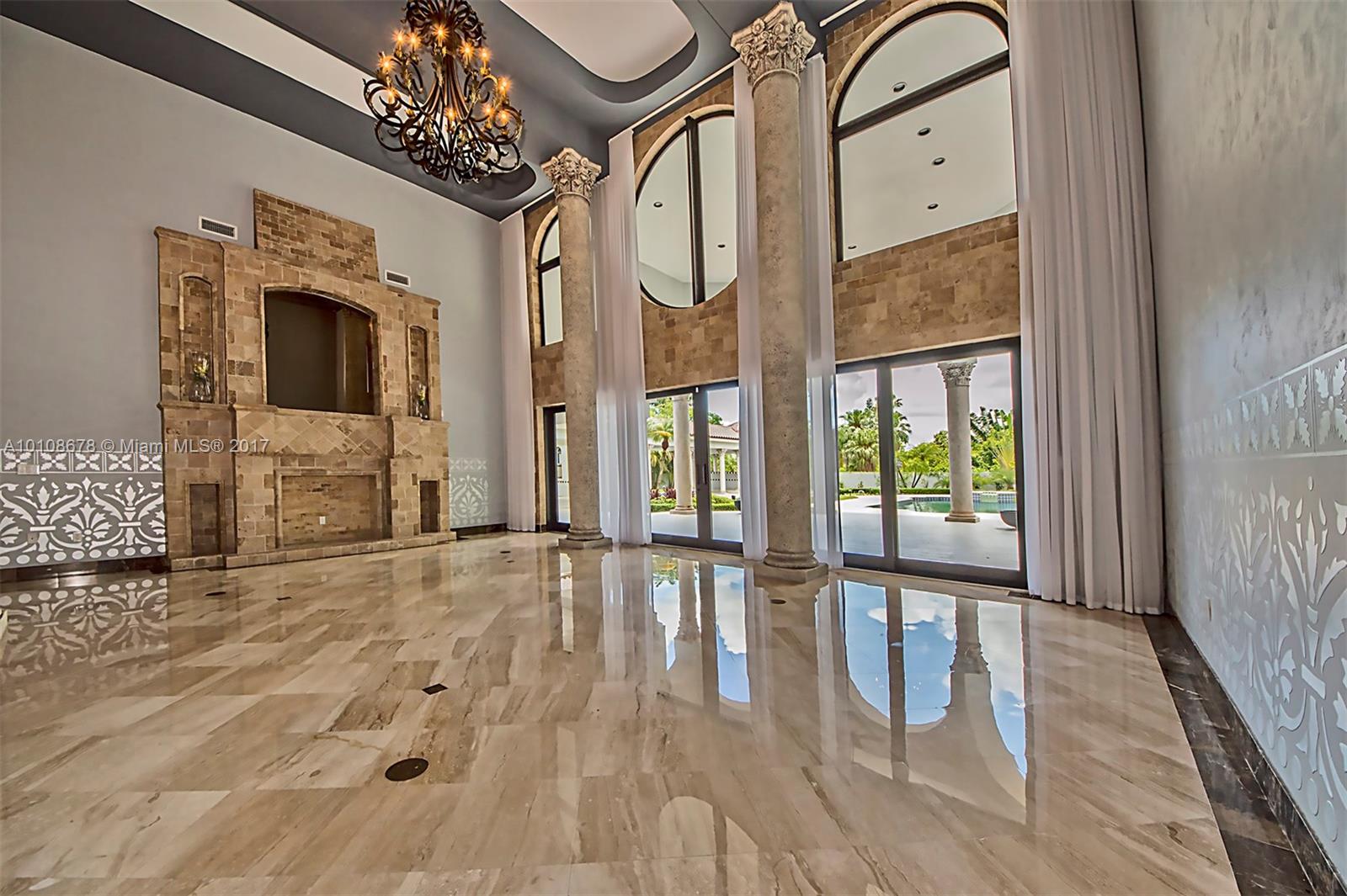 10270 Southwest 58th Street Miami, FL 33173 - Photo 8 of 35 a view of an entryway with wooden floor