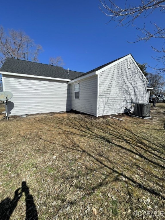 471 Pedro Pitts Road Caret, VA 22436 - Photo 19 of 19 View of side of home with central AC