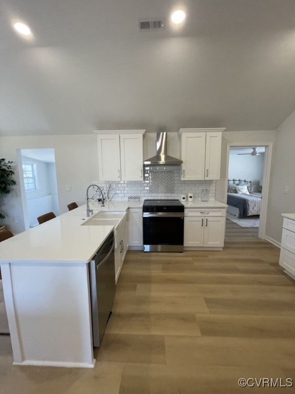 471 Pedro Pitts Road Caret, VA 22436 - Photo 7 of 19 Kitchen featuring electric stove, visible vents, s
