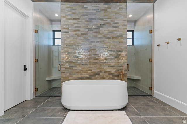 2192 East Outlaw Road Kamas, UT 84036 - Photo 42 of 80 Freestanding soaking tub with a stacked stone accent wall
