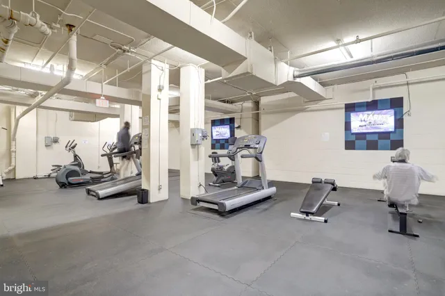 an aerial view of a house with a garden and plants