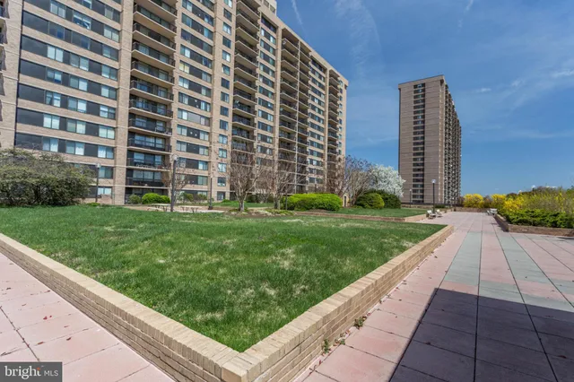 a view of a city with tall buildings