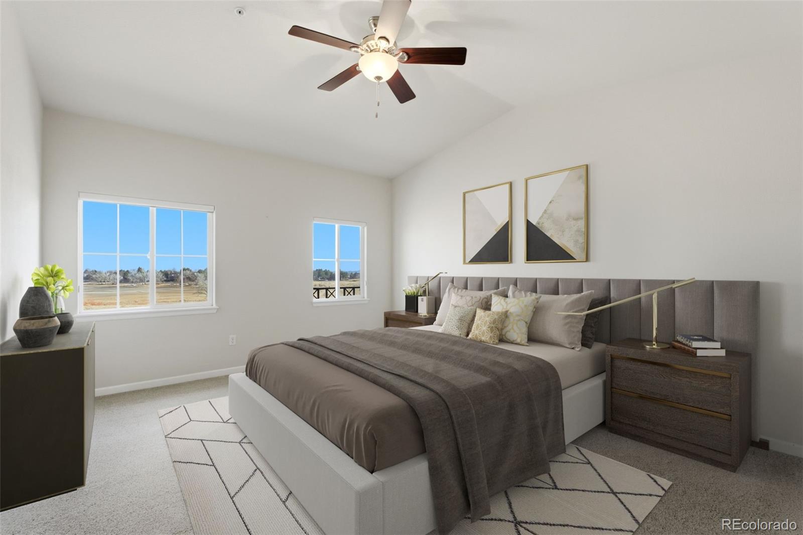6223 Kilmer Loop, Unit 201 Golden, CO 80403 - Photo 12 of 44 a bedroom with a bed and a window