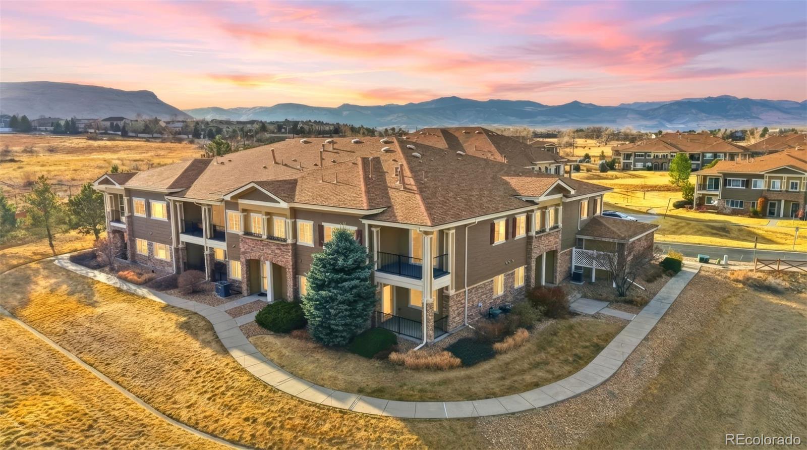 6223 Kilmer Loop, Unit 201 Golden, CO 80403 - Photo 21 of 44 an aerial view of residential houses with outdoor space and river