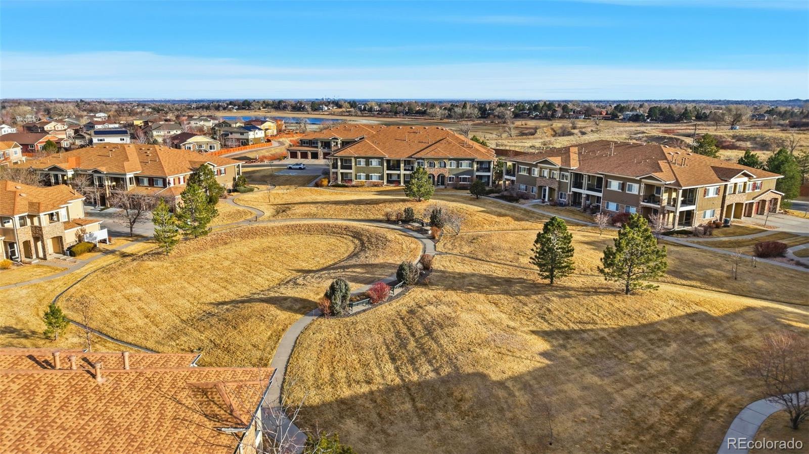 6223 Kilmer Loop, Unit 201 Golden, CO 80403 - Photo 29 of 44 an aerial view of residential houses with outdoor space