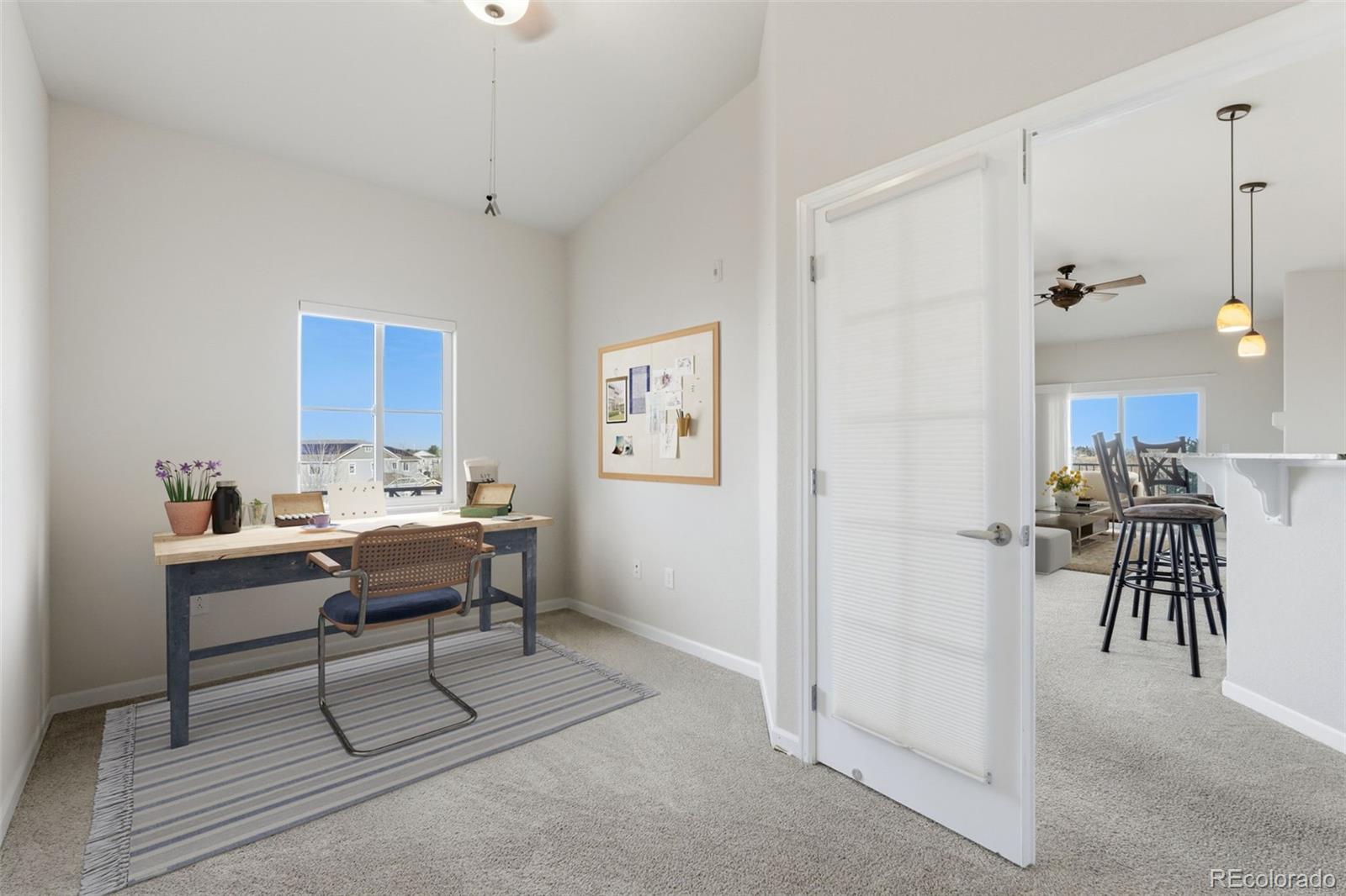 6223 Kilmer Loop, Unit 201 Golden, CO 80403 - Photo 3 of 44 a view of a livingroom with furniture and workspace