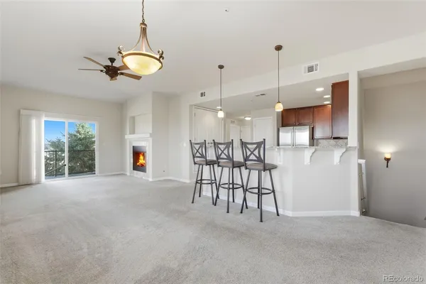 a view of a dining room with furniture