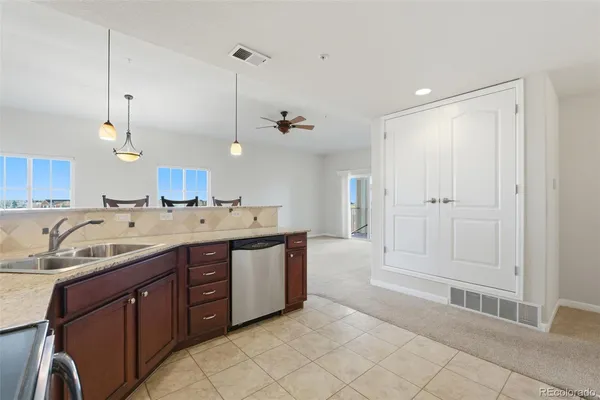 a bathroom with a sink double vanity and a mirror