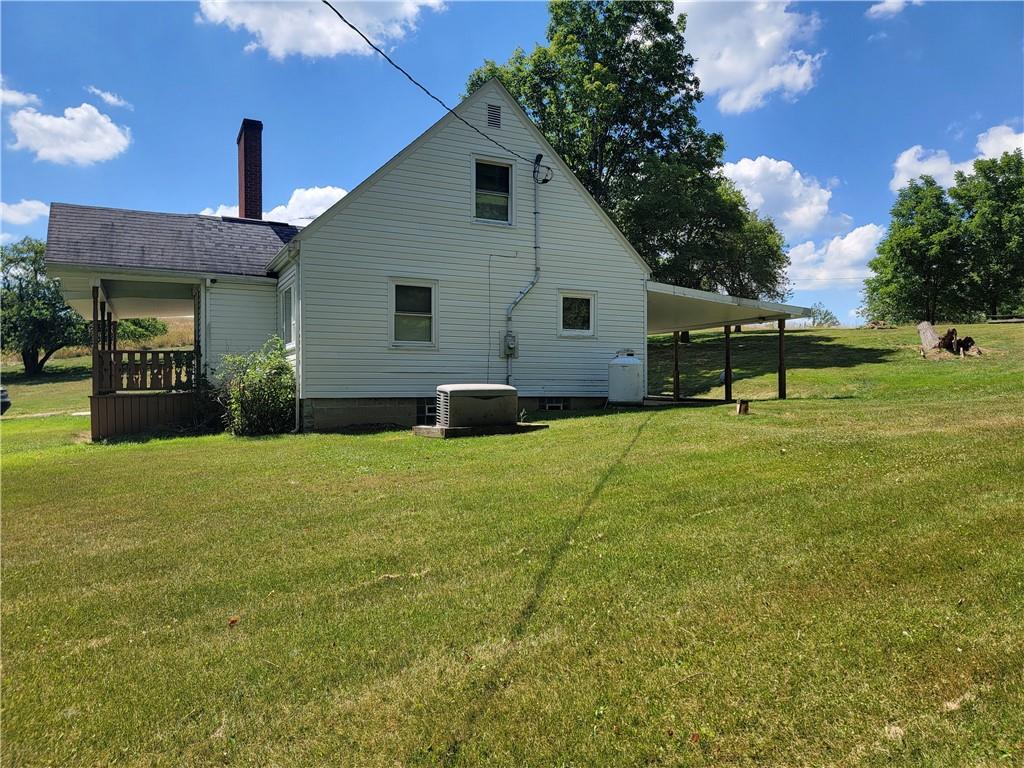 1715 Byers Road Mahaffey, PA 15757 - Photo 2 of 17 a view of a house with backyard and garden