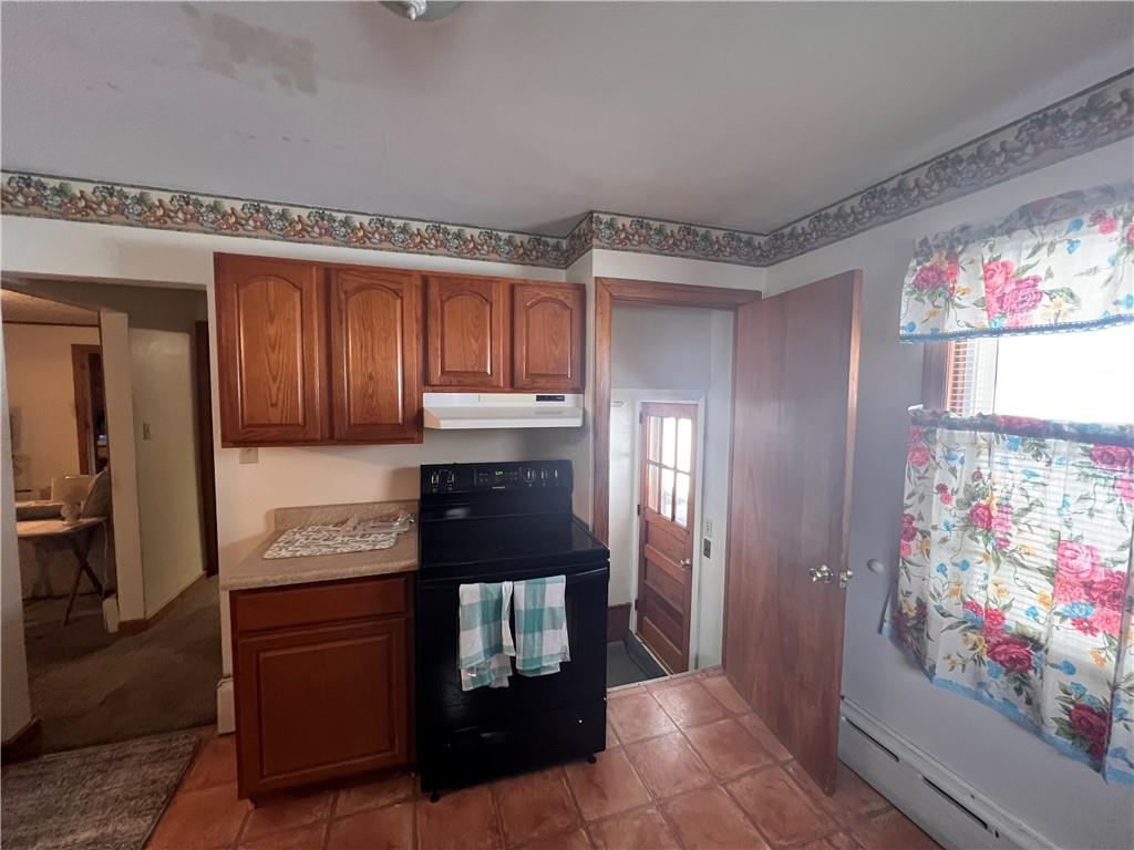 1715 Byers Road Mahaffey, PA 15757 - Photo 7 of 17 a kitchen with granite countertop a refrigerator and a sink