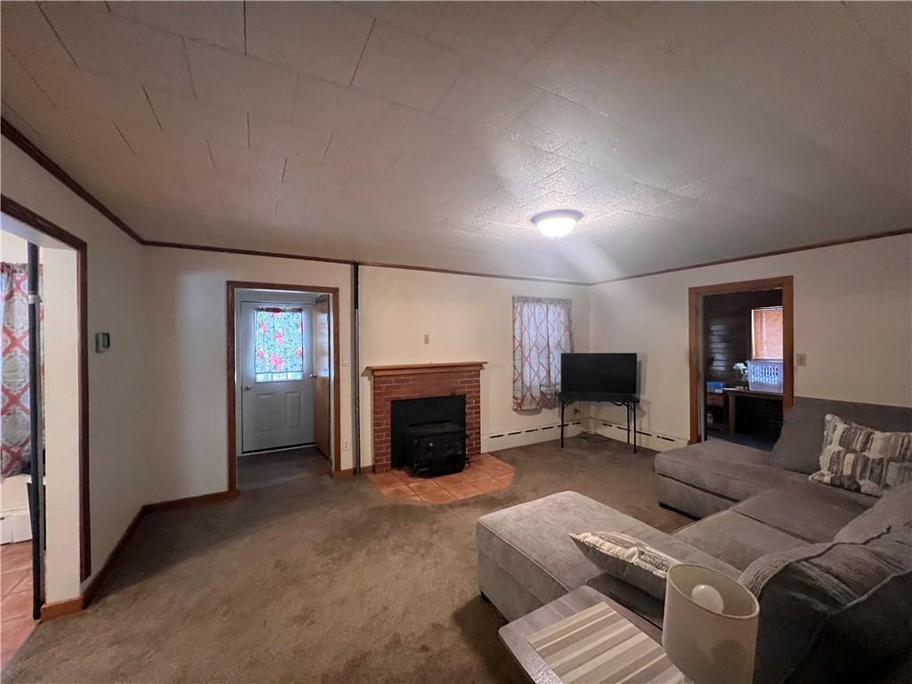 1715 Byers Road Mahaffey, PA 15757 - Photo 8 of 17 a living room with furniture and a fireplace