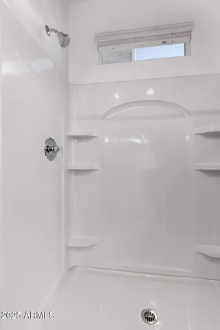 a close view of a shower in the bathroom