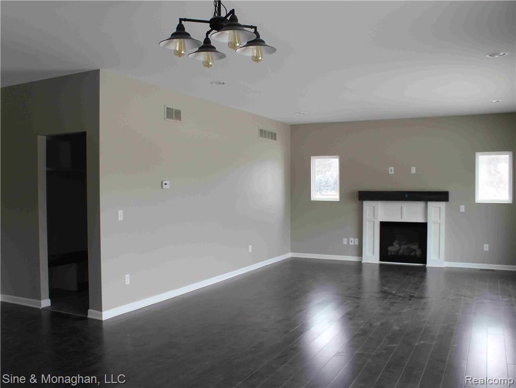395 Otter Run Road Holly, MI 48442 - Photo 5 of 6 Great room with fireplace