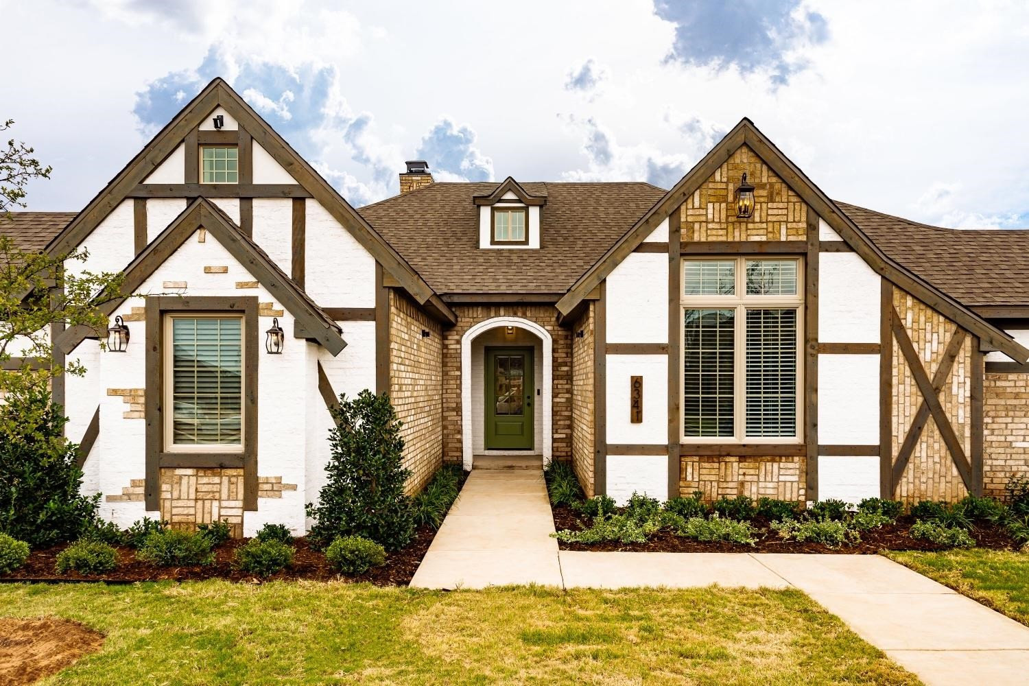 6341 88th Lubbock, TX 79424 - Photo 1 of 1 a front view of a house with garden