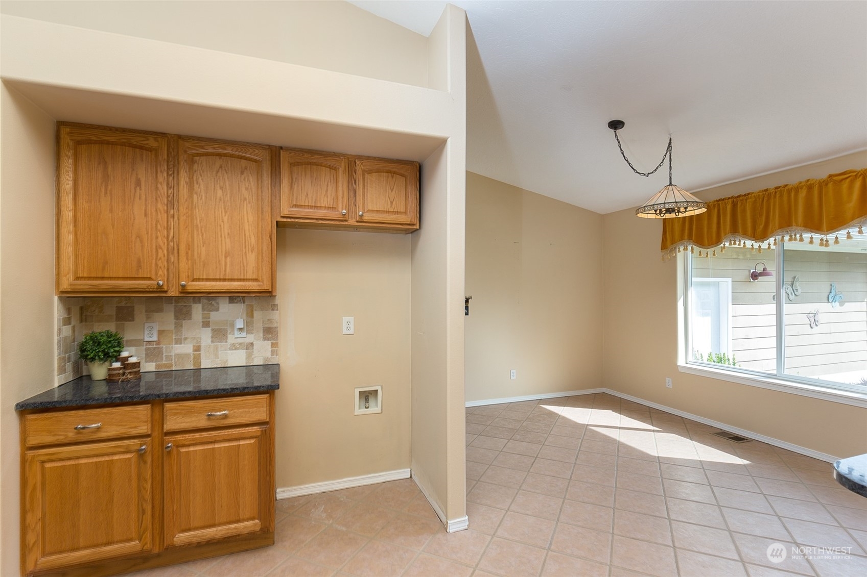 371 Autumn Road Sequim, WA 98382 - Photo 15 of 39 an empty room with window and cabinet